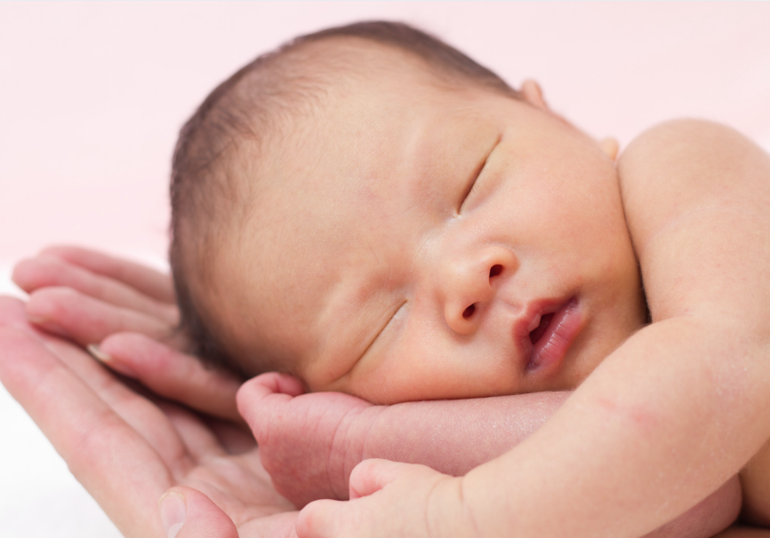 Close up of new born baby's face. 