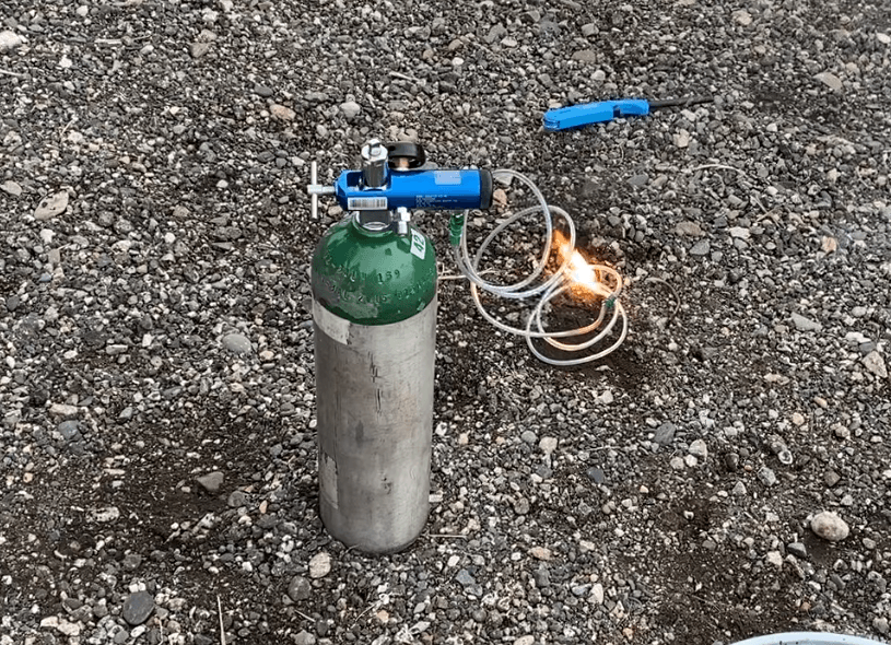 Flames shoot from a nasal cannula on fire. 